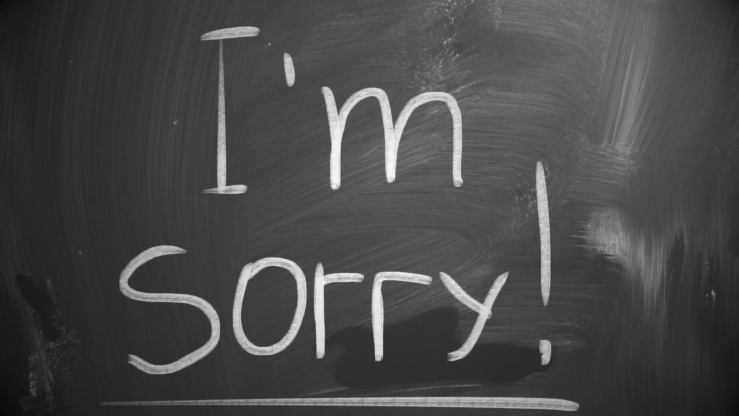 Convicted Driver Black and white image of the words "I'm Sorry!" written in chalk on a blackboard.