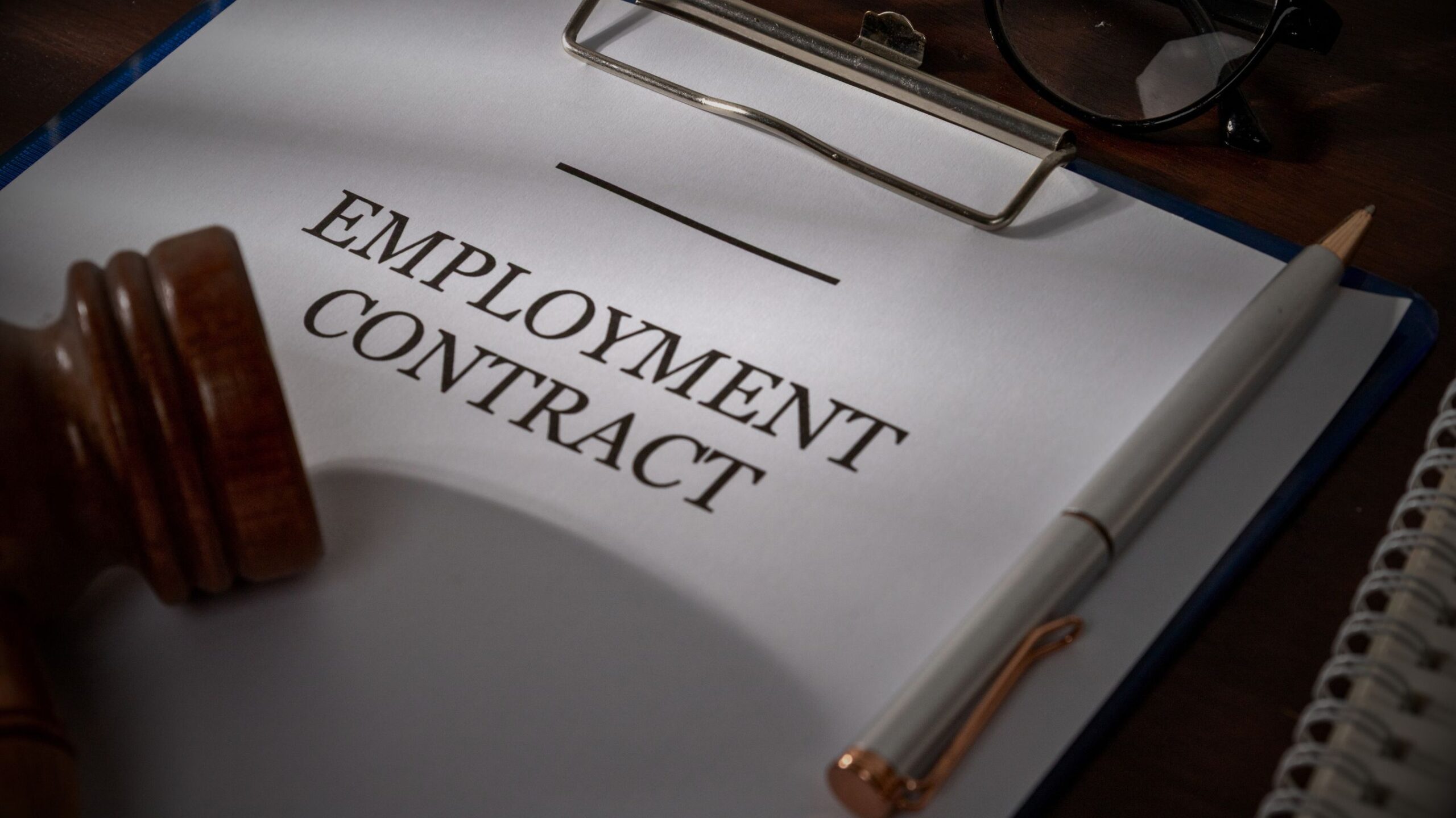 An image displaying an Employment Contract, which also represents Employment Law and legal services.