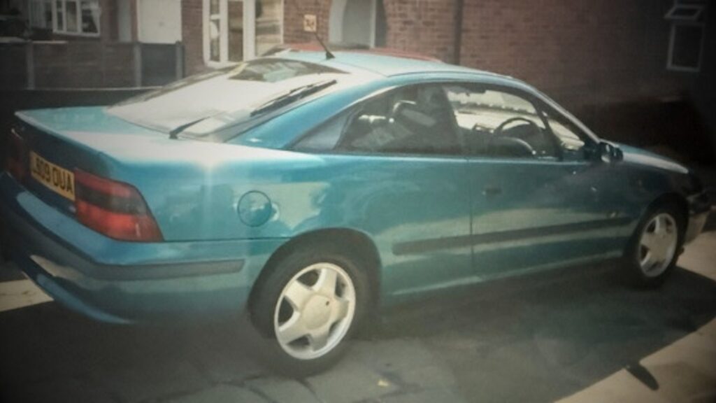 Using the image of the classic Vauxhall Calibra and the context of the VINTTRO Members Interview, here is the SEO-optimised content tailored for your lifestyle brand. 1. Image Metadata for SEO Alt Text: Rear profile of a classic teal Vauxhall Calibra parked on a driveway, showcasing the iconic aerodynamic silhouette for a VINTTRO member's interview.